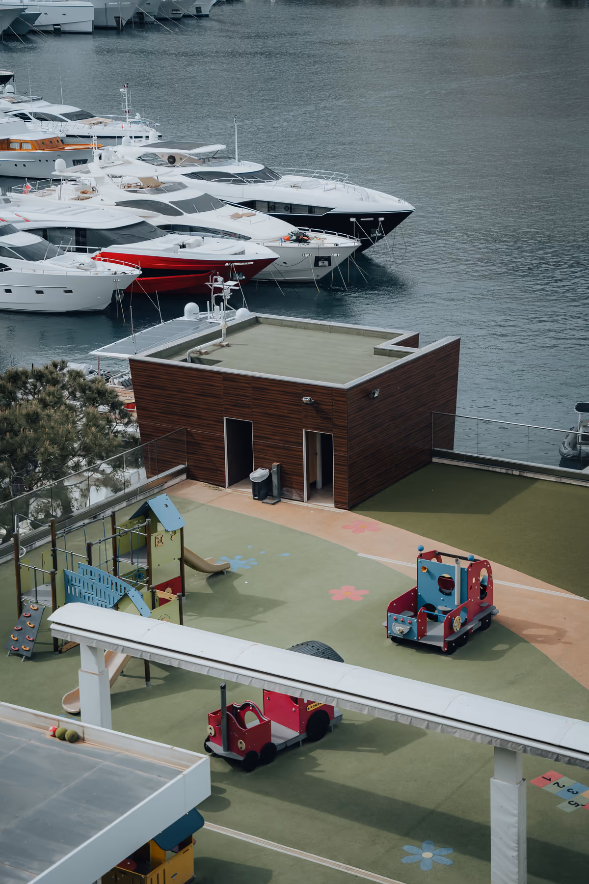 Playground rooftop overlooking moored yachts